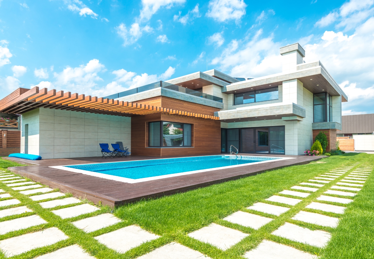 Stunning exterior design by Artisan Building and Contractor Company, enhancing homes with expert craftsmanship.